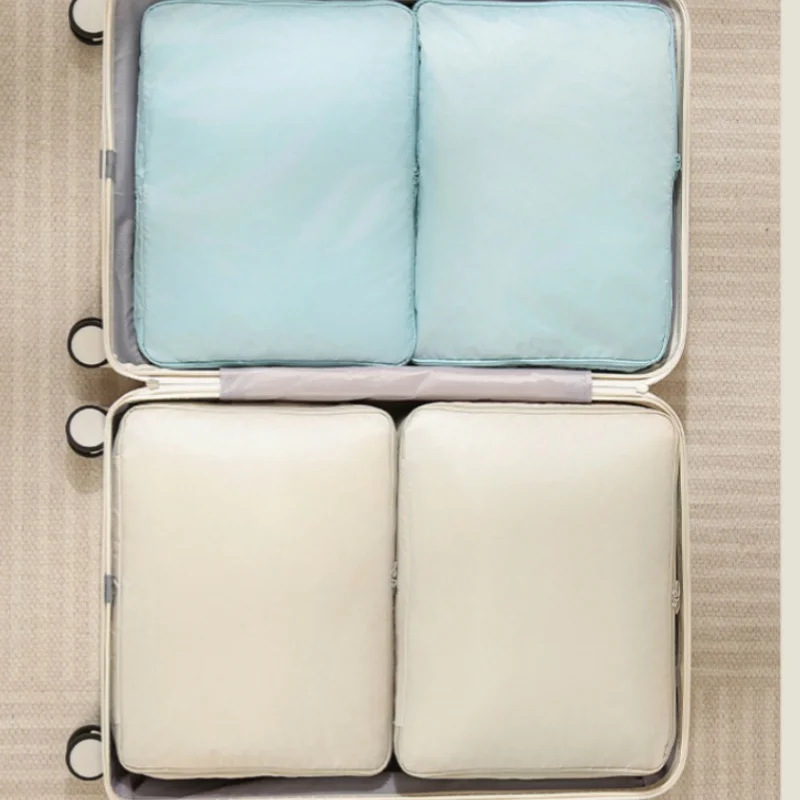 Clothes comforter Foldable storage bag Travel clothes organizer bag Multi-purpose portable suitcase Clothing doggy bag