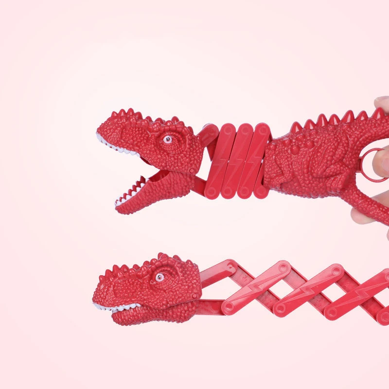 Novelty Dinosaur Sprina Retractable Bite ManipulatorClip Tricky Toy Spring biting extendable tool hand claw dinosaur grabber toy