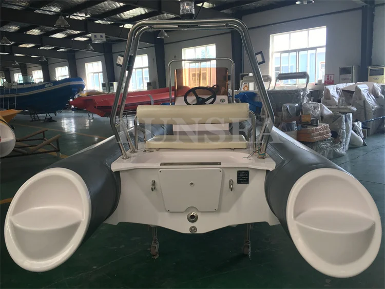 time-limited 16 ft 4.8 m fiberglass / aluminum hull inflatable air tube rowing sport fishing propeller boat