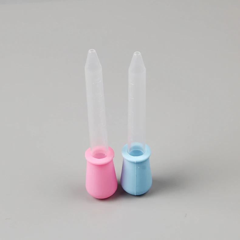 Newborn baby with scale silicone dropper feeder