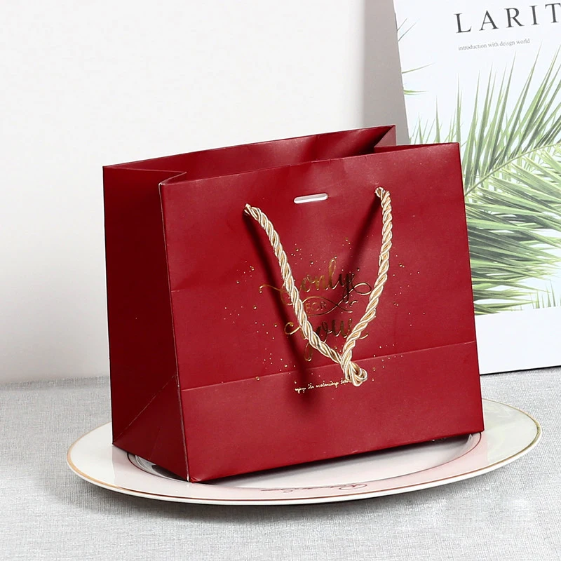 
Wholesale Custom Printed Logo Art Paper Gift Bag Shopping Paper Bag With PP Handles 