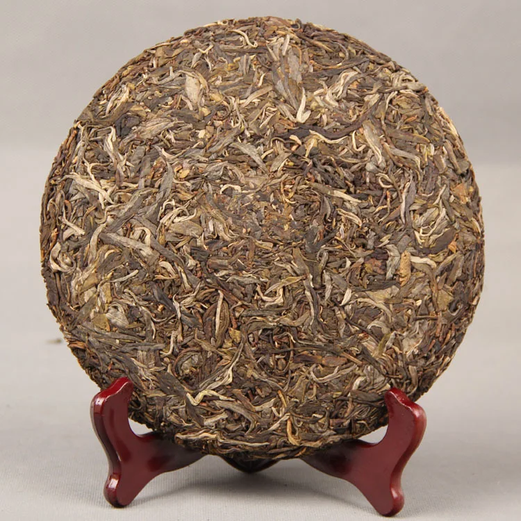 Factory Supply Famous Chinese Puerh Yiwu Ancient Tree  Hand Made Shen Puer Cha Bing Yunnan qi Zi Bing Cha
