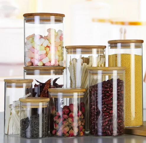 Customized Wholesale 1 2 4 8 oz Small Mini large Size Clear Frosted Honey Food Empty Storage Bottle Glass jars with Bamboo Lids