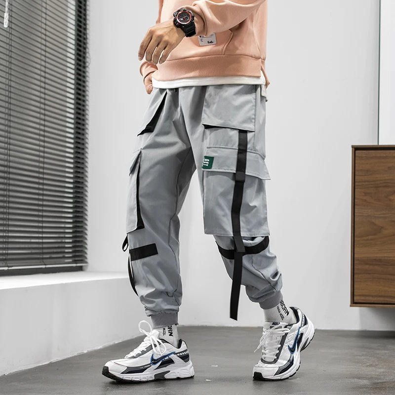 2022 autumn new fashion design loose fit mens cargo pants with fabric strips tape custom printing logo pants