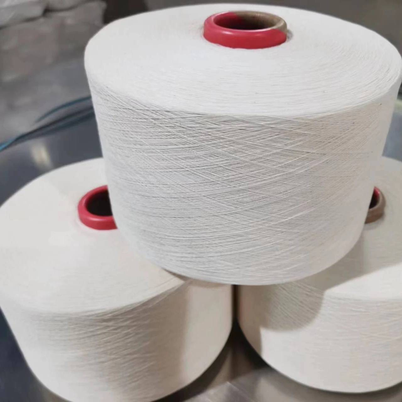 The factory produces 100% OE cotton yarn for knitting and weaving