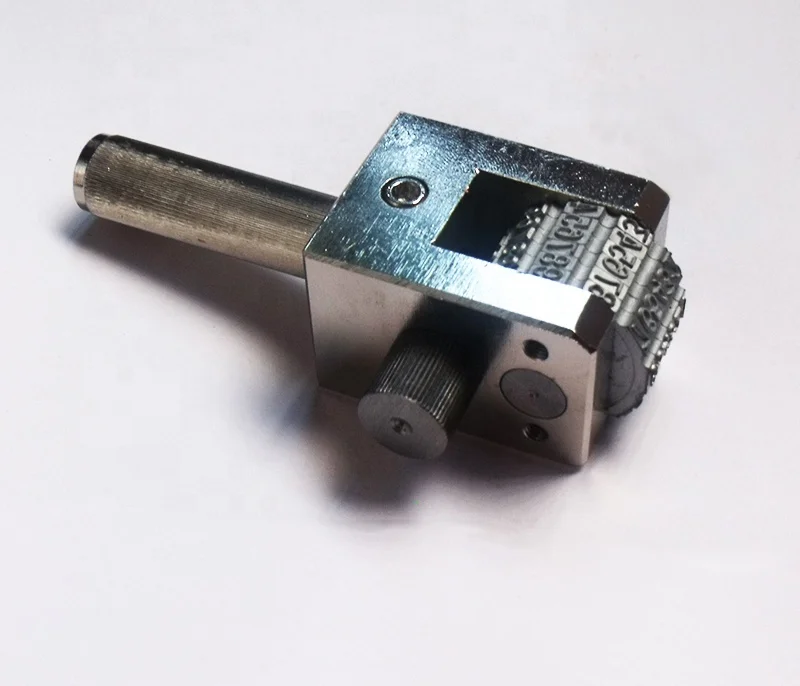 numbering head by hand press printing number on metal