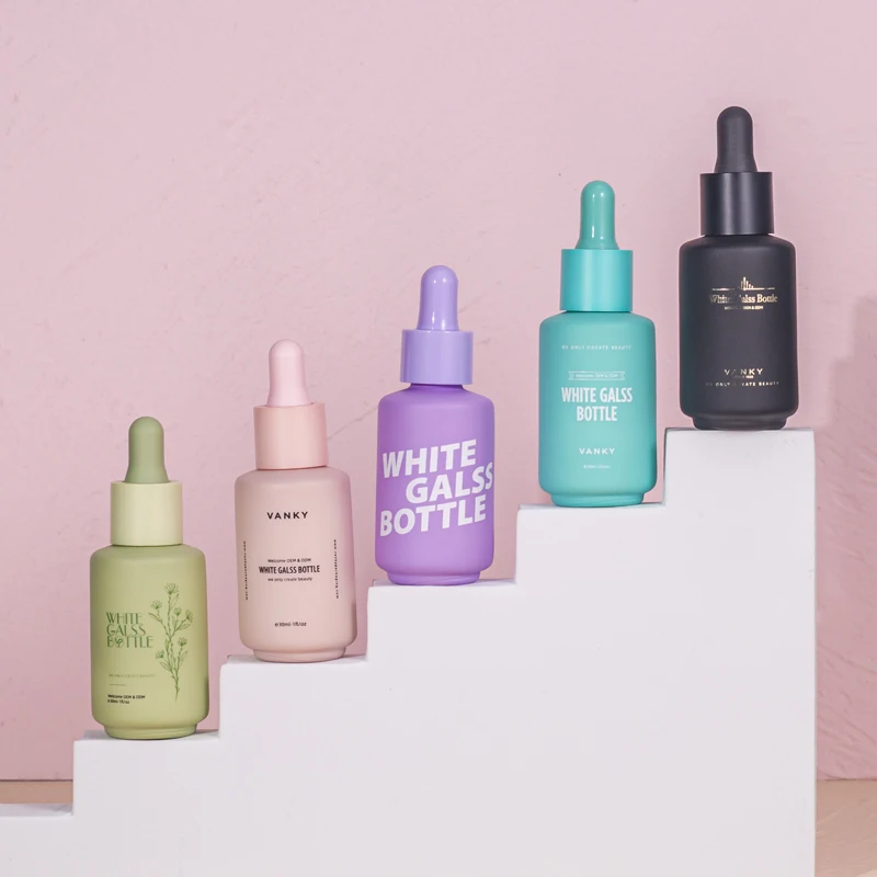 Colorful 1 Oz White Black Cosmetic Pink Essential Glasses Oil Glass Dropper Bottles With Custom logo