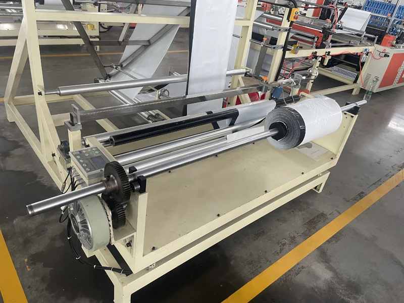 Automatic  LDPE/PP/OPP/BOPP plastic film triangle folding plastic bag rubber film making machinery price