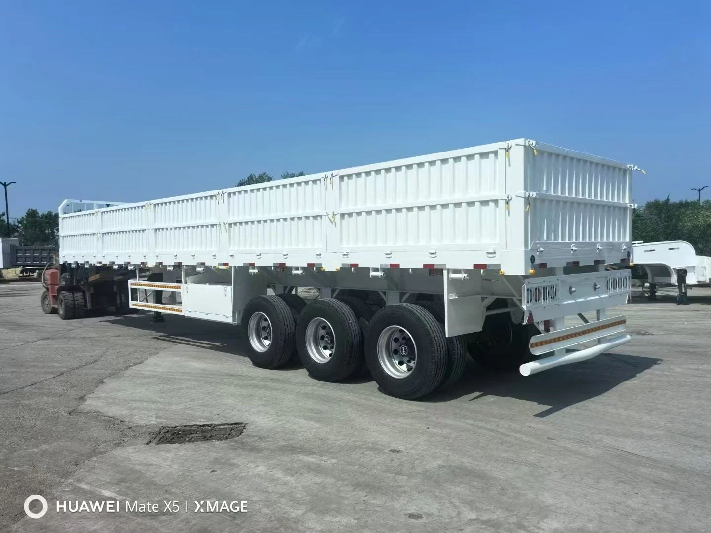 Hot selling 3 4 Axels 10m-18m 50 ton 80 ton transport semi-trailer 100 ton low chassis truck trailer for sale