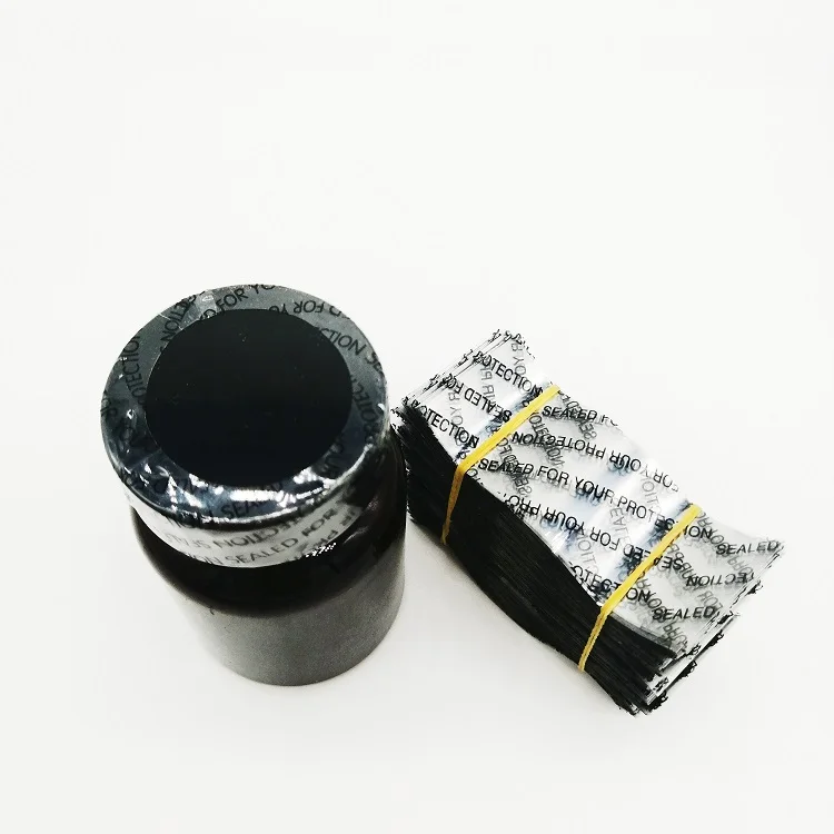 PVC Shrink Bands Printed Black Sealed For Your Protection with Perforation Single Vertical Perf  for safety seals