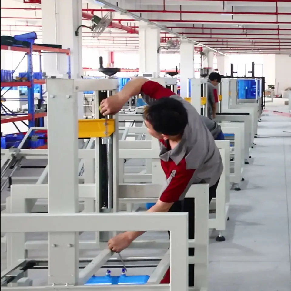 China Manufacturer Low Price Good Quality Automatic Strapping Machine Box Edge Sealing Machine With Great Price