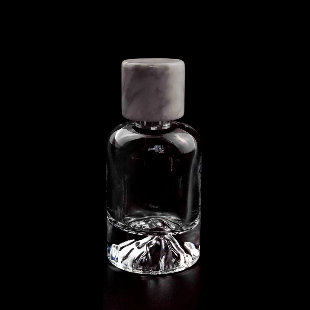 50ml Custom design high quality luxury thick base special crystal clear glass perfume bottle with resin cap