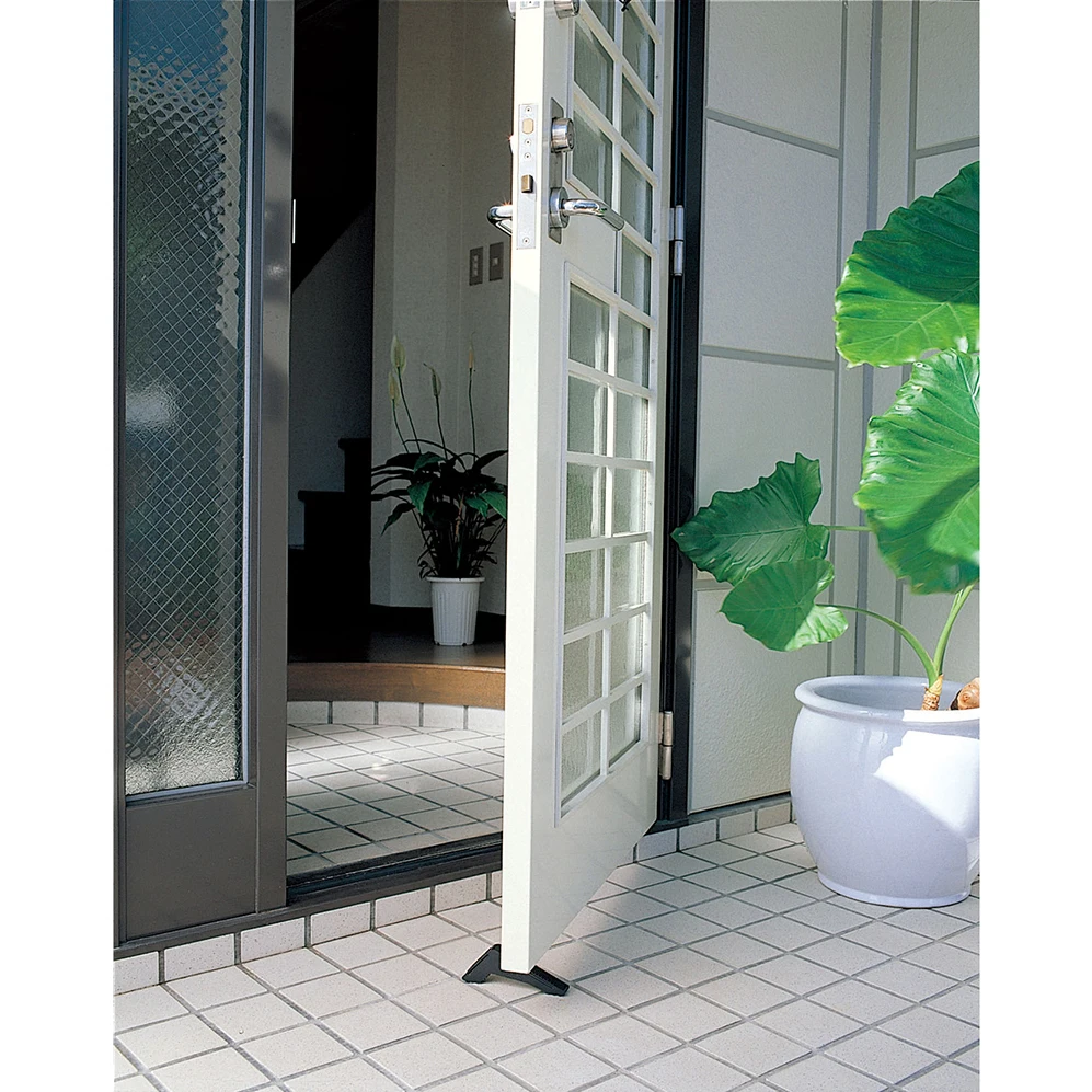 Reusable synthetic rubber magnet home security floor stop for door