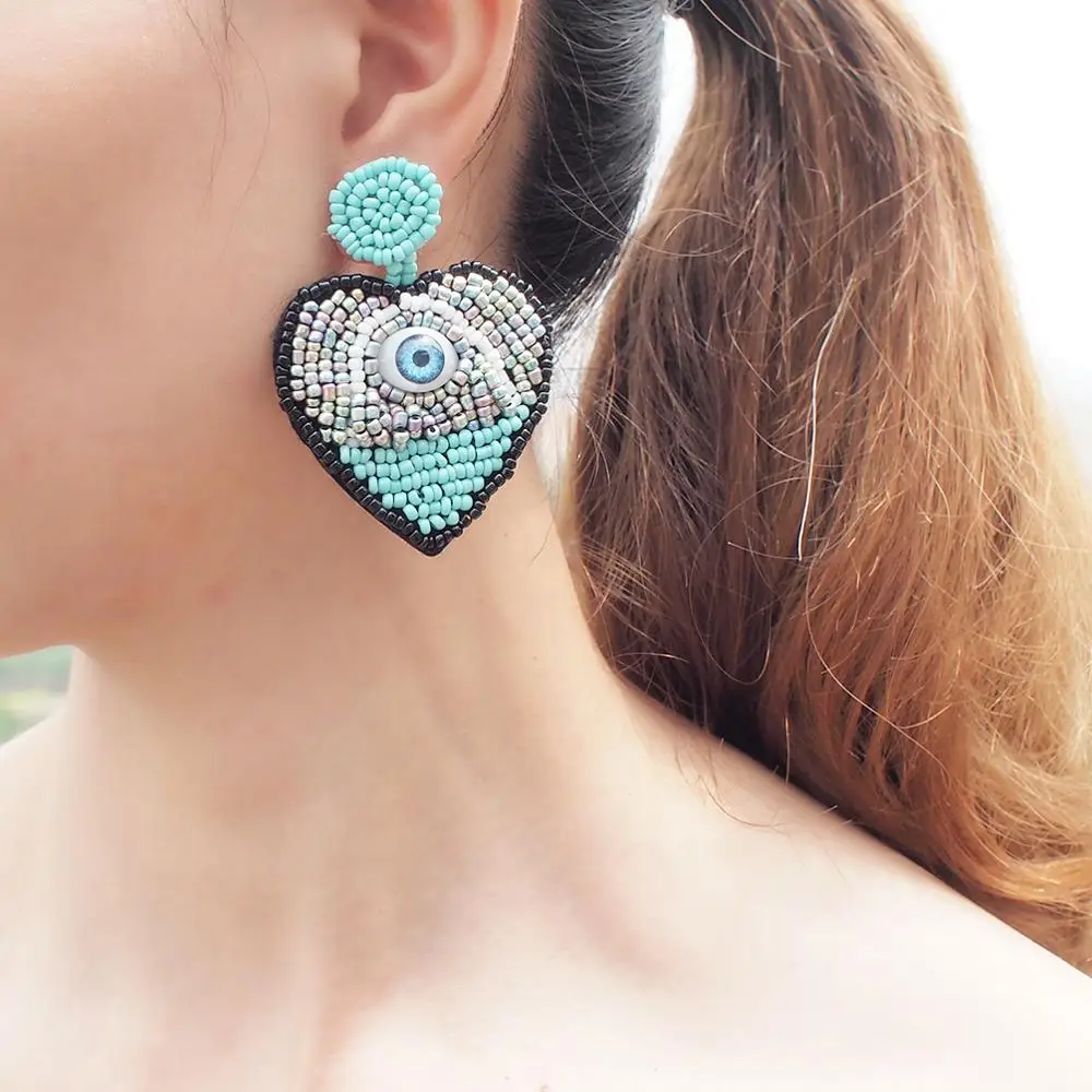 HANSIDON Trendy Statement Resin Heart Earrings Women Hot New Fashion Jewelry Devi Eye Design Drop Dangle Plastic Beaded