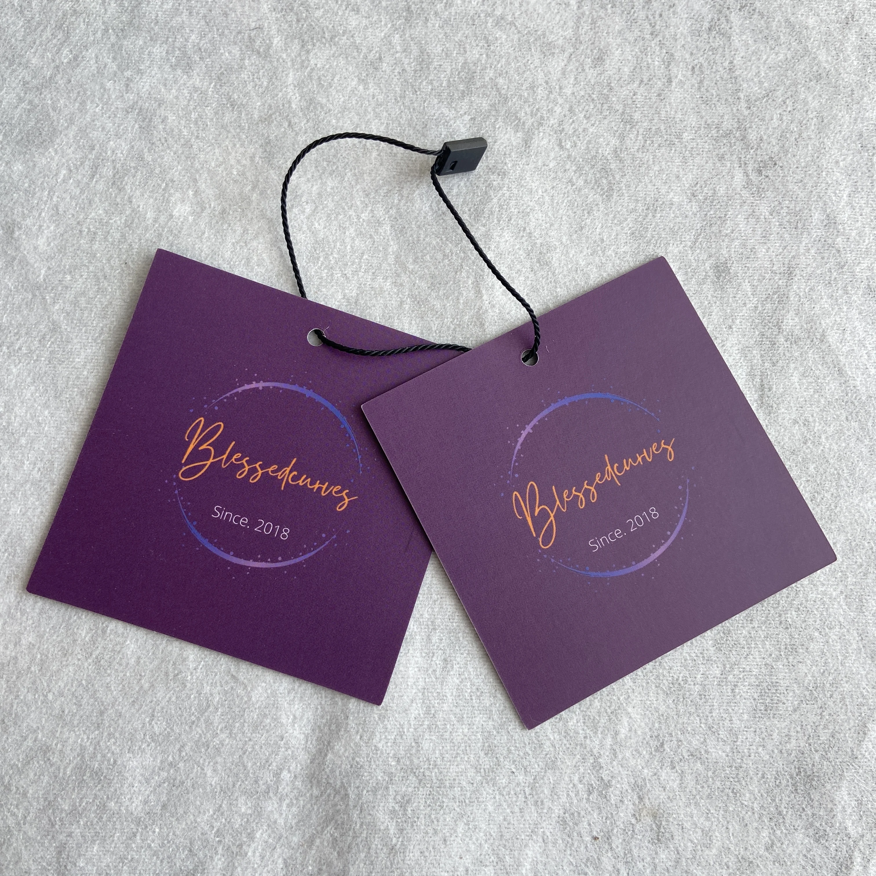 Cheap Fashion Embossed Swing Paper Tags Luxury Matte LOGO Hangtags Clothing Custom Hang Tag For Garment Brand