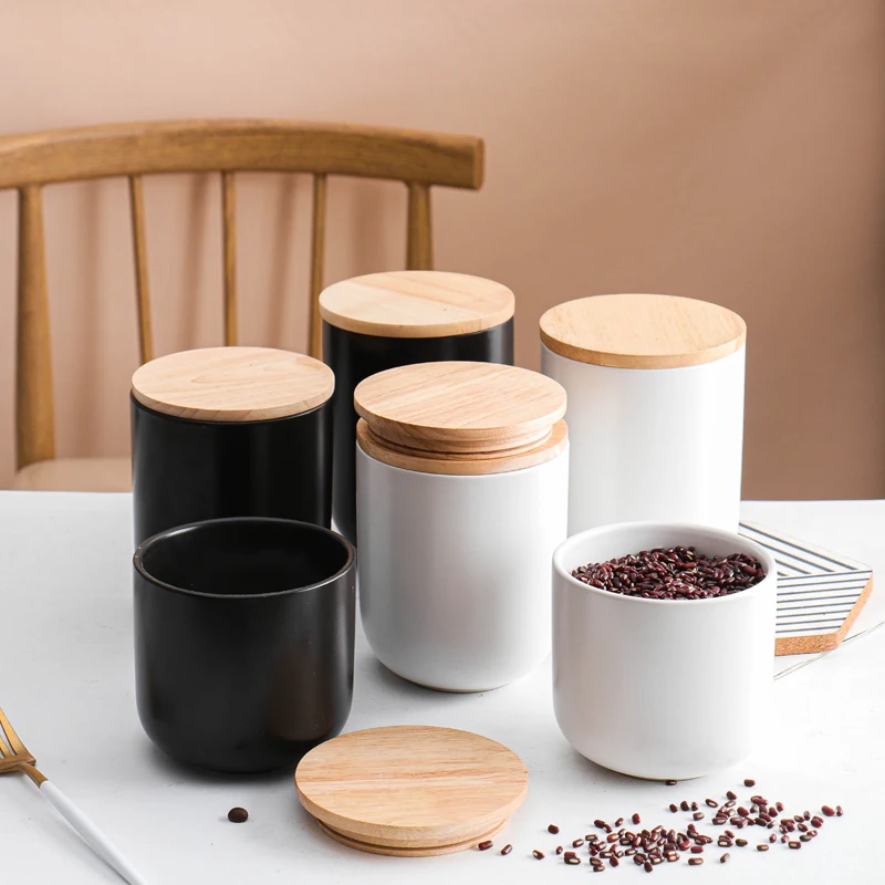 Custom logo matte color glaze kitchenware ceramic storage jars tea coffee sugar canister sets with wood lid