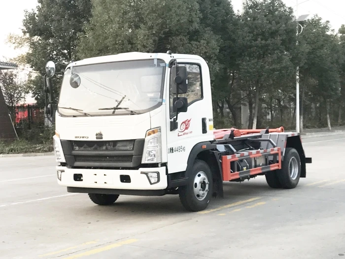 SINOTRUK 4*2  7cbm   garbage truck road on road off bin hook lifter garbage truck