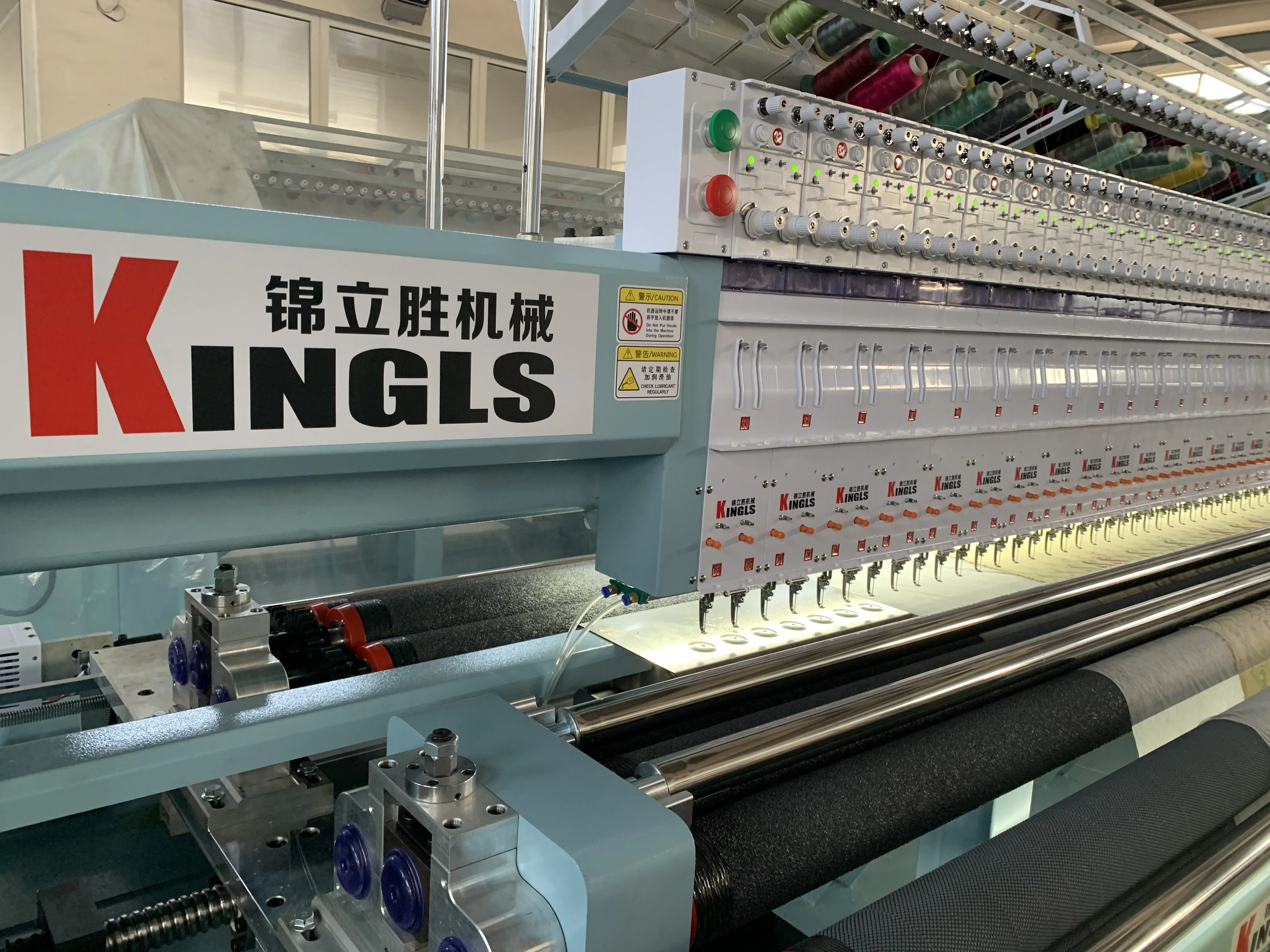 Multi needle quilting embroidery machine for quilt garment sofa cover and bedspread