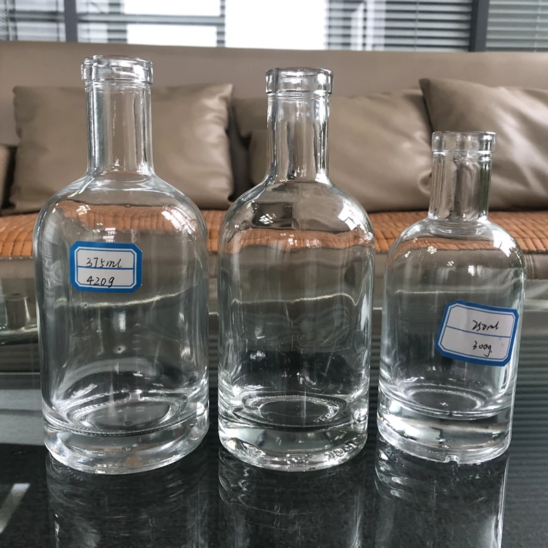 Hot selling free samples transparent frosted 100 ml glass vodka bottle reusable customized glass bottle for vodka
