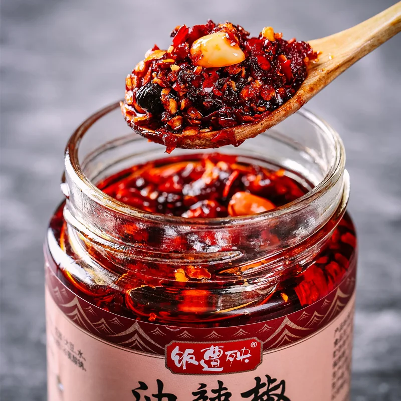 A spoonful of Sichuan flavor mixed with vegetables and noodles tastes good spices and seasonings Oil pepper