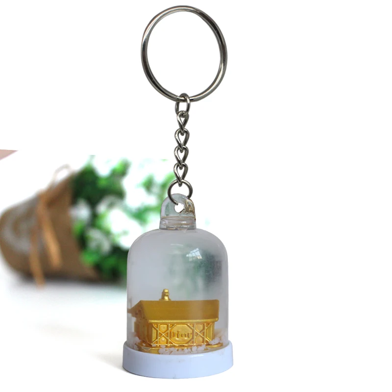 resin craft travel souvenir gift snow globe Factory custom wholesale miniature snow globe keychain resin souvenir decoration