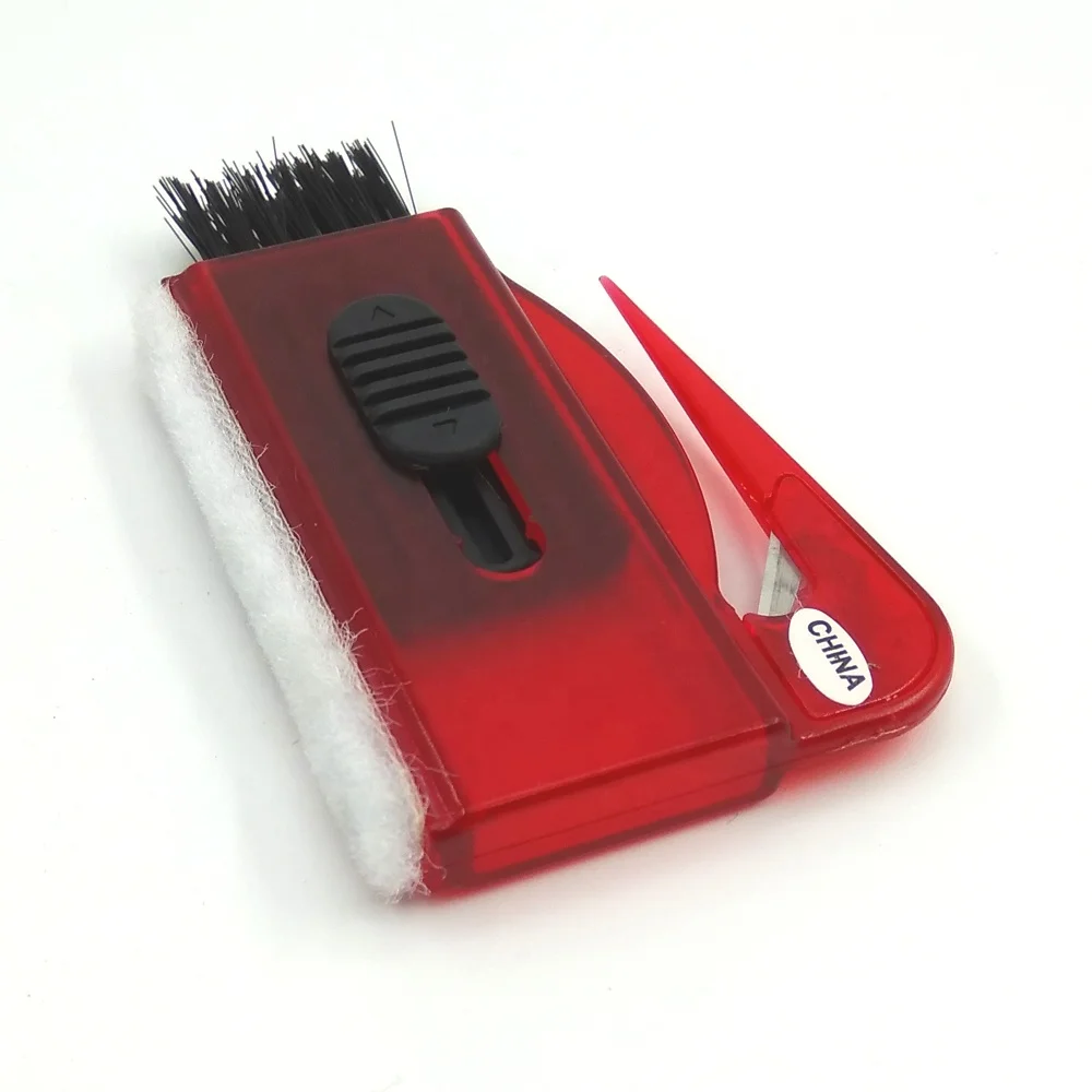 
computer keyboard brush with letter opener 