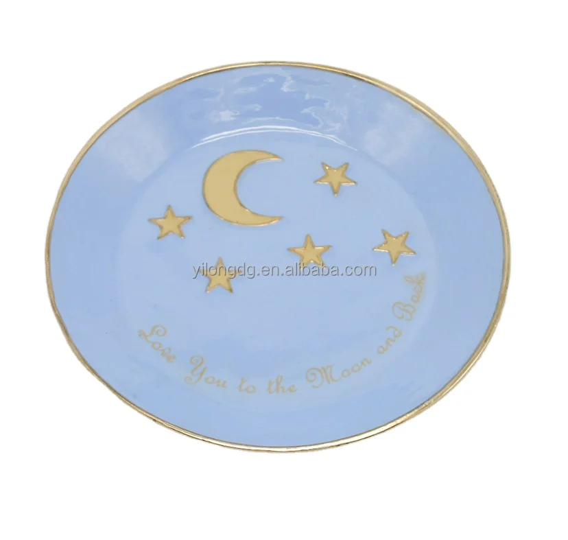 round ring dish with moon and star decoration