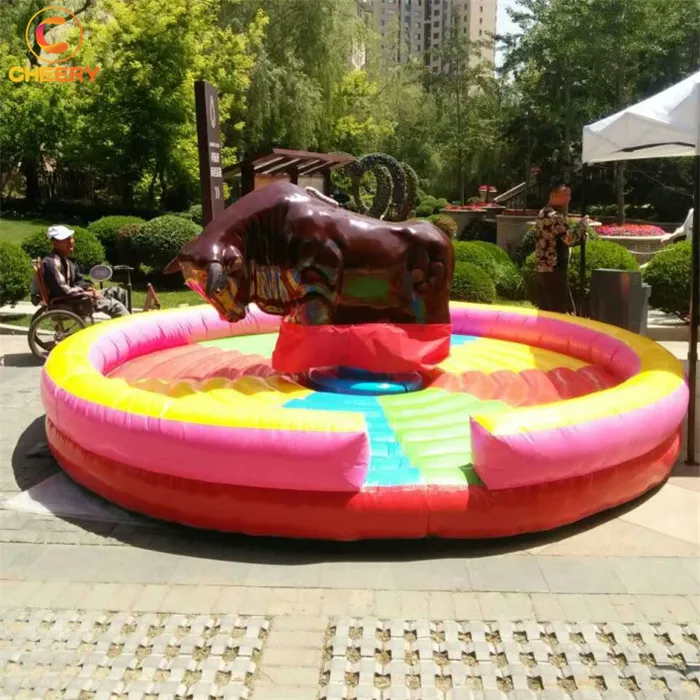 Crazy inflatable ride on animals outdoor playground bull riding inflatable mechanical rodeo bull ride