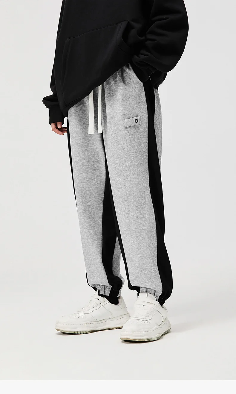 High street side contrast color beam foot guard autumn new product pleated stitching casual pants men