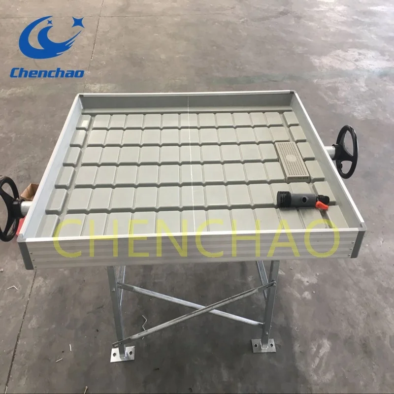 Greenhouse Structure With Flood And Drain Hydro Table