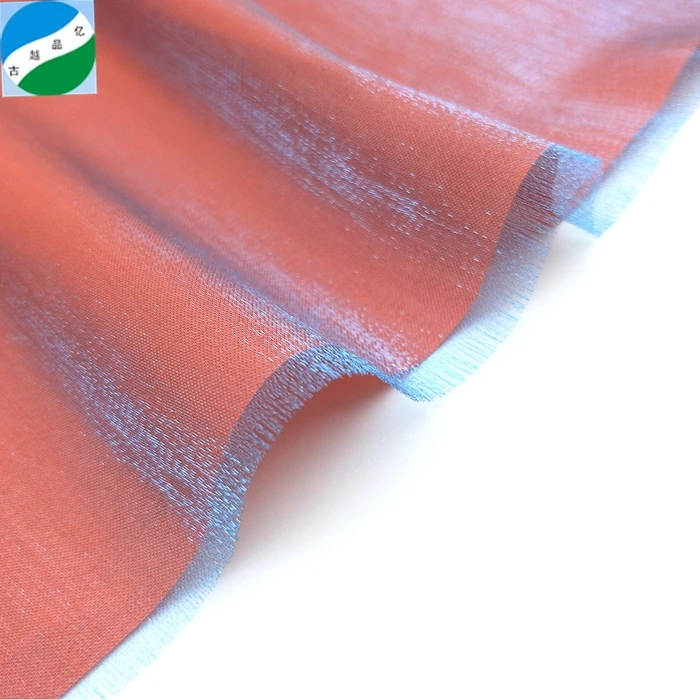 High quality  100% woven rayon and polyester shiny  ready good fabric stock lot for garment