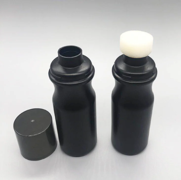 Empty Shoe Polish Bottle With