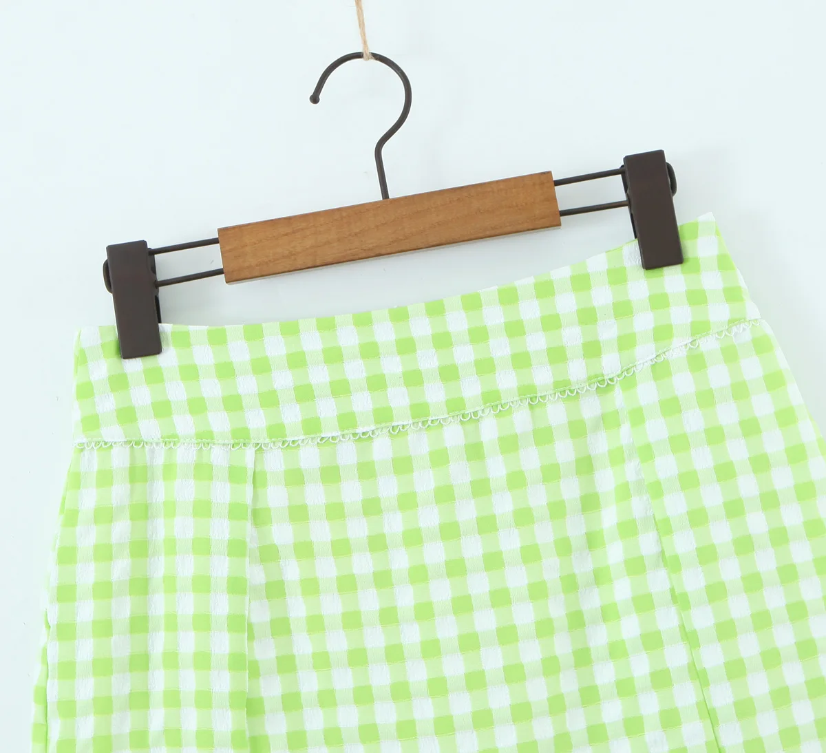 Green color front slit and bow tie back zipper casual fashion mini skirt for women