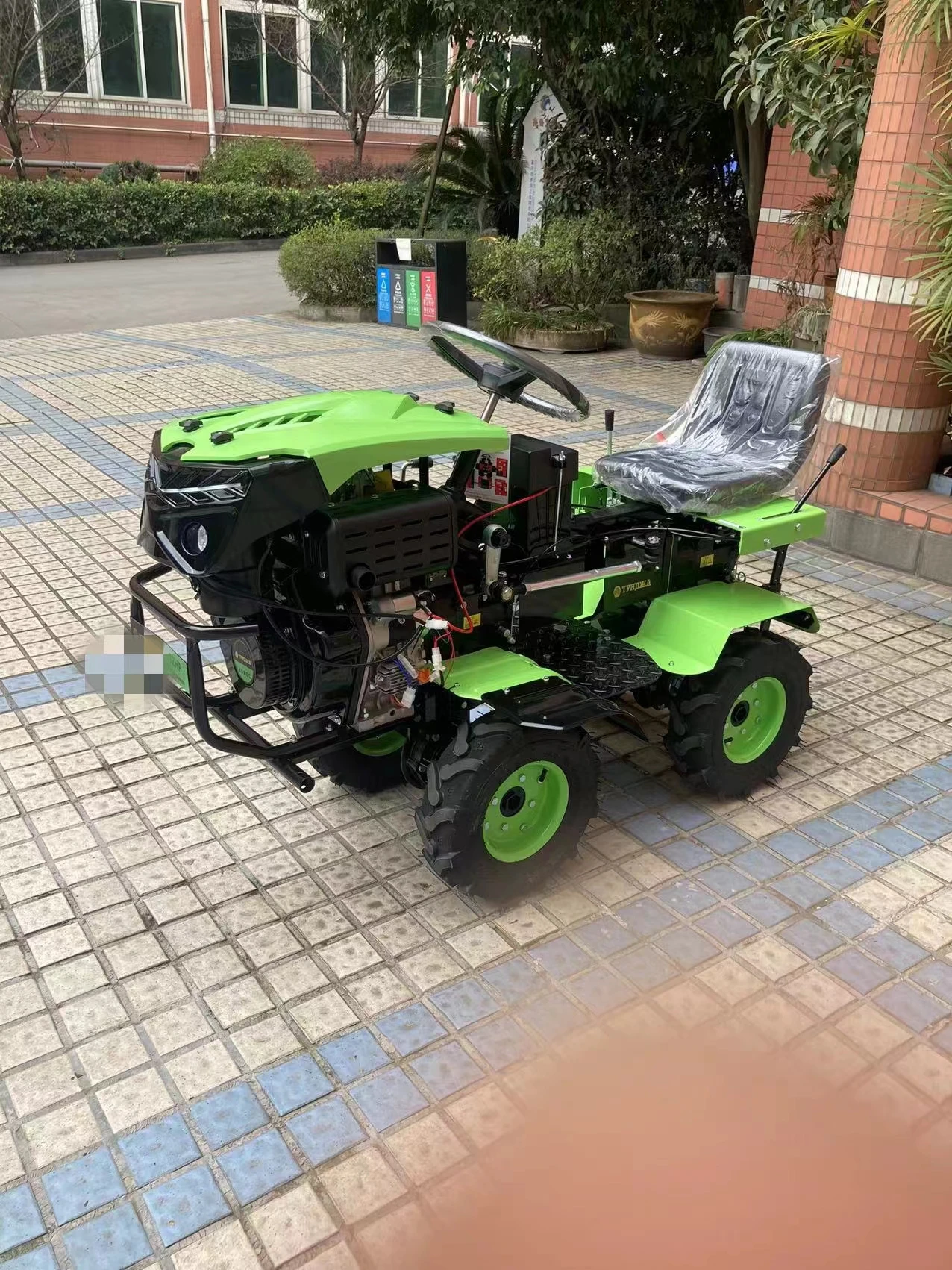 Agricultural four-wheel drive ride-type micro tiller household small plough rotary tiller diesel seat car micro tiller