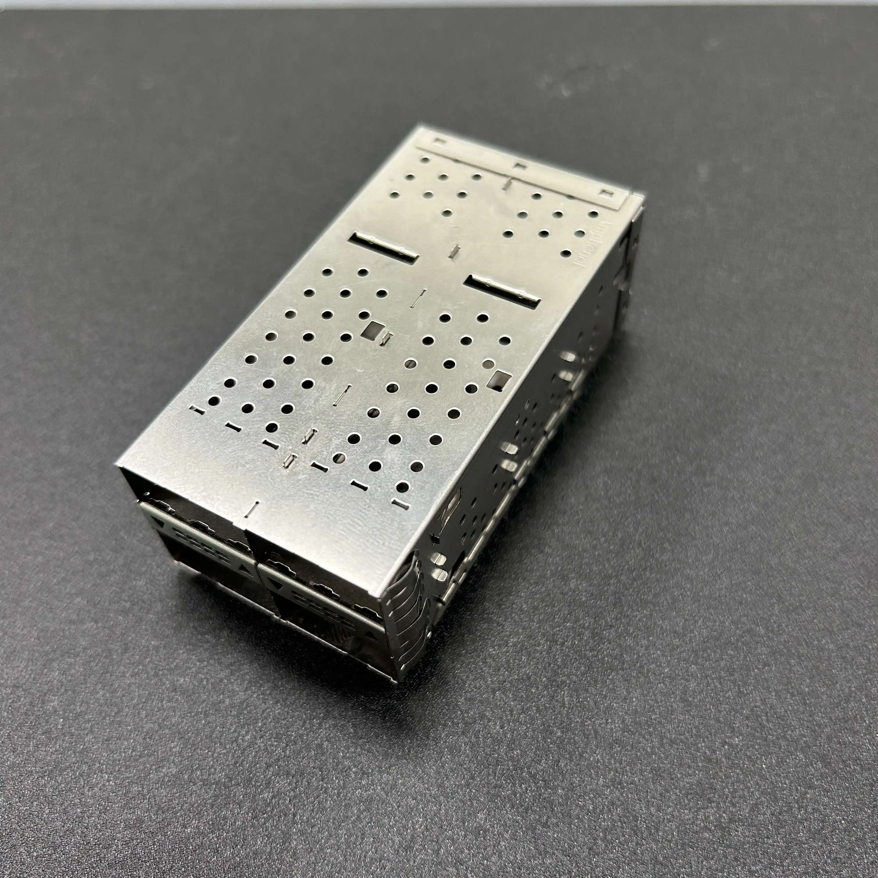 Optical fiber connector module shield cover The optical fiber module has a seat son shield Metal shield crimp pin connector