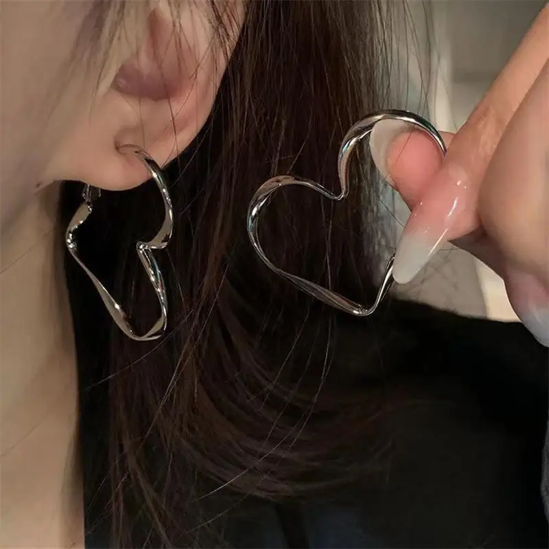 FM never son! Original love earrings niche design sense fashion all matching women senior studs silver