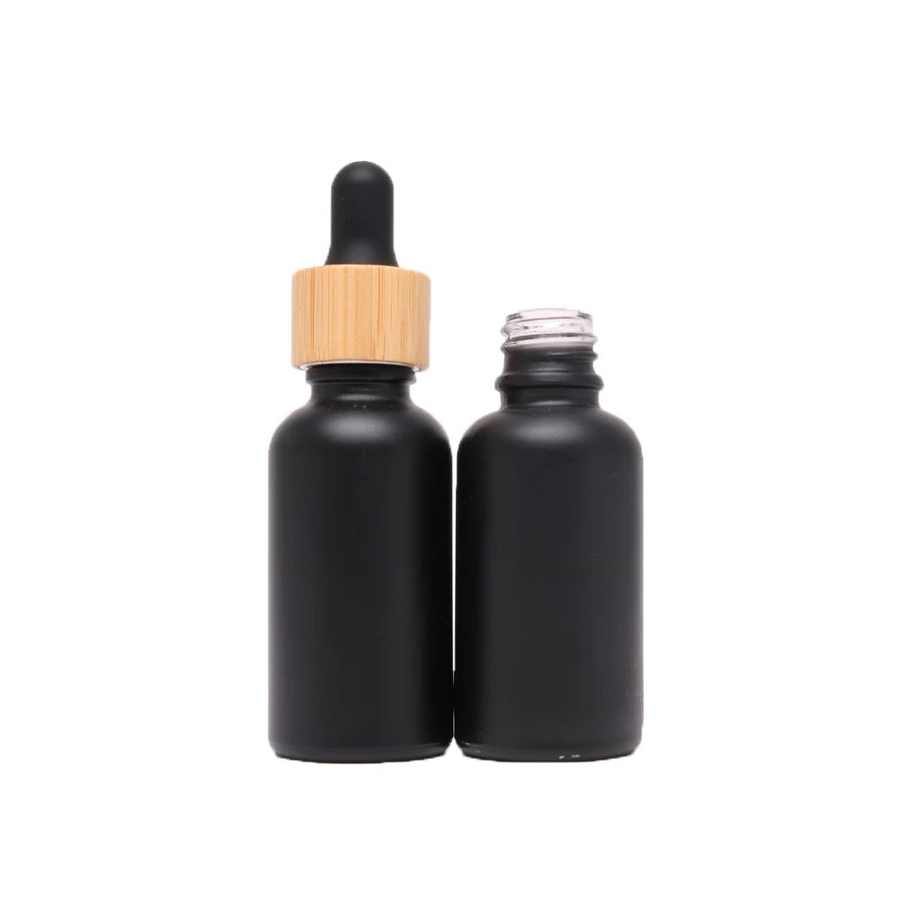 15 ml 20 ml 30 ml 50 ml 100 ml dark empty packaging black essential oil bottles with bamboo dropper cap