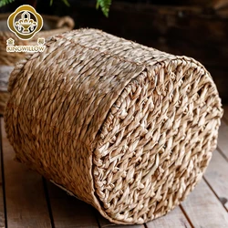 Handmade round water hyacinth grass laundry storage basket indoor planter basket with handle for home decor