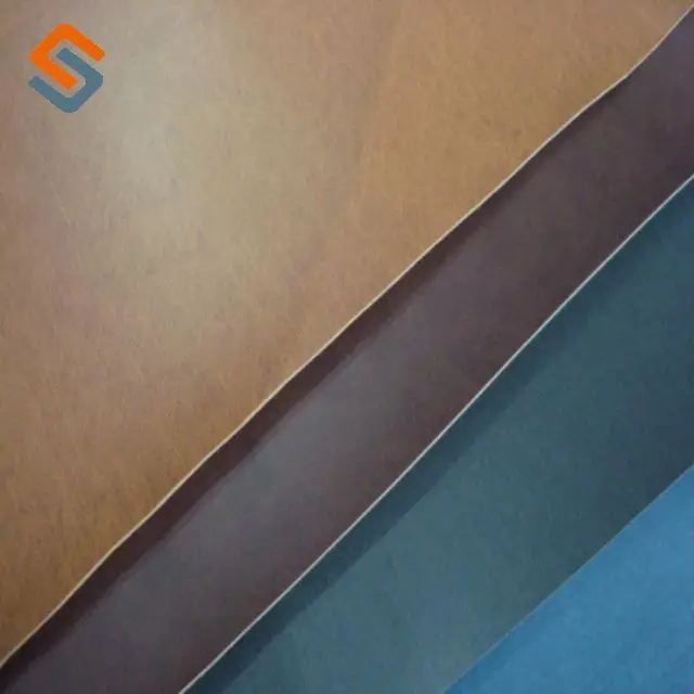 Hot Engraved Embossed Technology Pressure Change PU Leather for Jeans Label