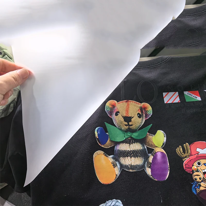 MOREINK Luminous dtf film roll 60cm A3 sheet cutter A4 hot peel PET film dtf  roll for dtf printer heat transfer printing