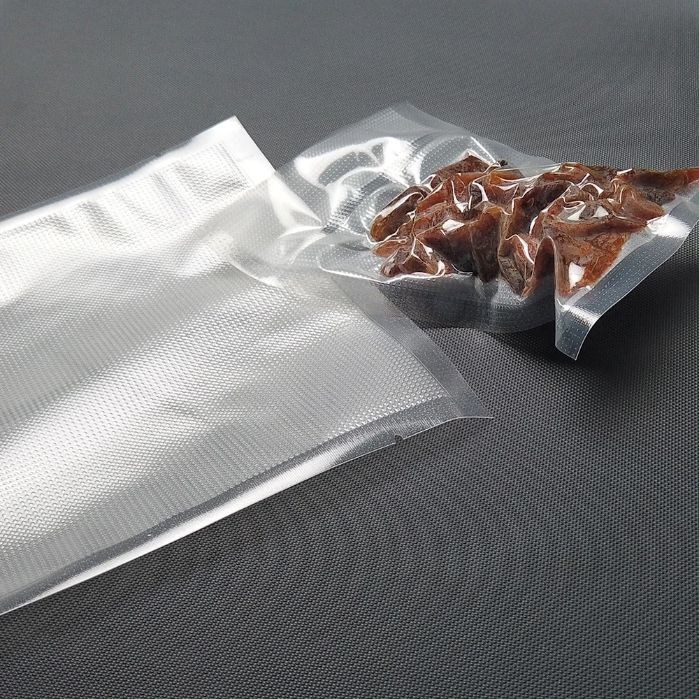 Wholesale Transparent PE Freezer Vacuum Bags Embossed Vacuum Sealer Bag Roll Bulk  Food Nylon Plastic Packaging Shrink Film
