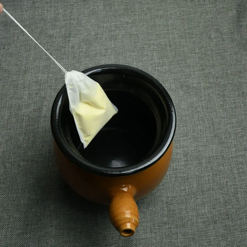 
Custom Food Safe Grade empty Non woven Fabric Packing Tea Bag with drawstring 