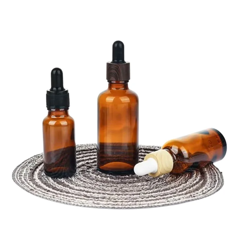 NQFIBER Empty Boston Dropper Bottle Good Price Oil Dropper Bottle Manufacturer Low Lid Of Cosmetic Packaging Roller Essential