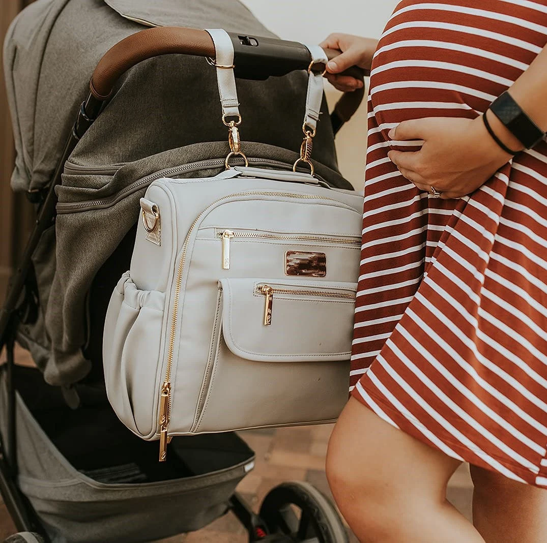 Hot Selling Custom Vegan leather waterproof baby diaper bag for mom and dad Baby Backpacks Mommy Bags With Stroller Changing Pad