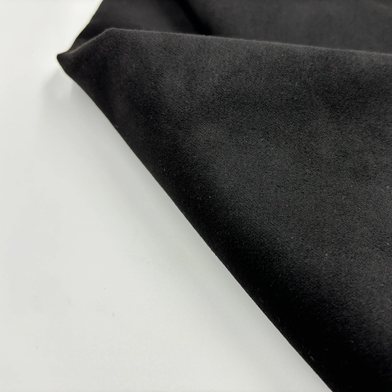 Low-Cost Wholesale 100% Polyester Black Suede Fabric for Bags Shoe Materials,and Car Seat Cushions