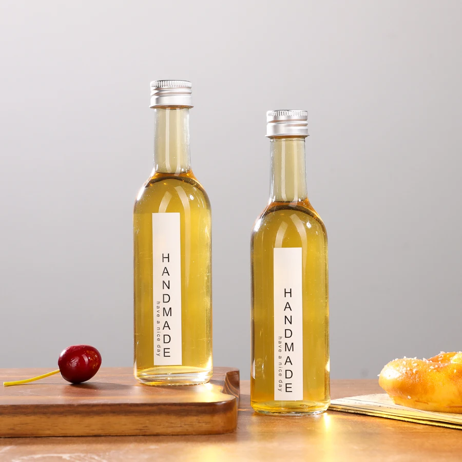 50ml 100ml mini whisky vodka glass wine bottle portable round shoulder clear long neck small spirits bottle with screw cap