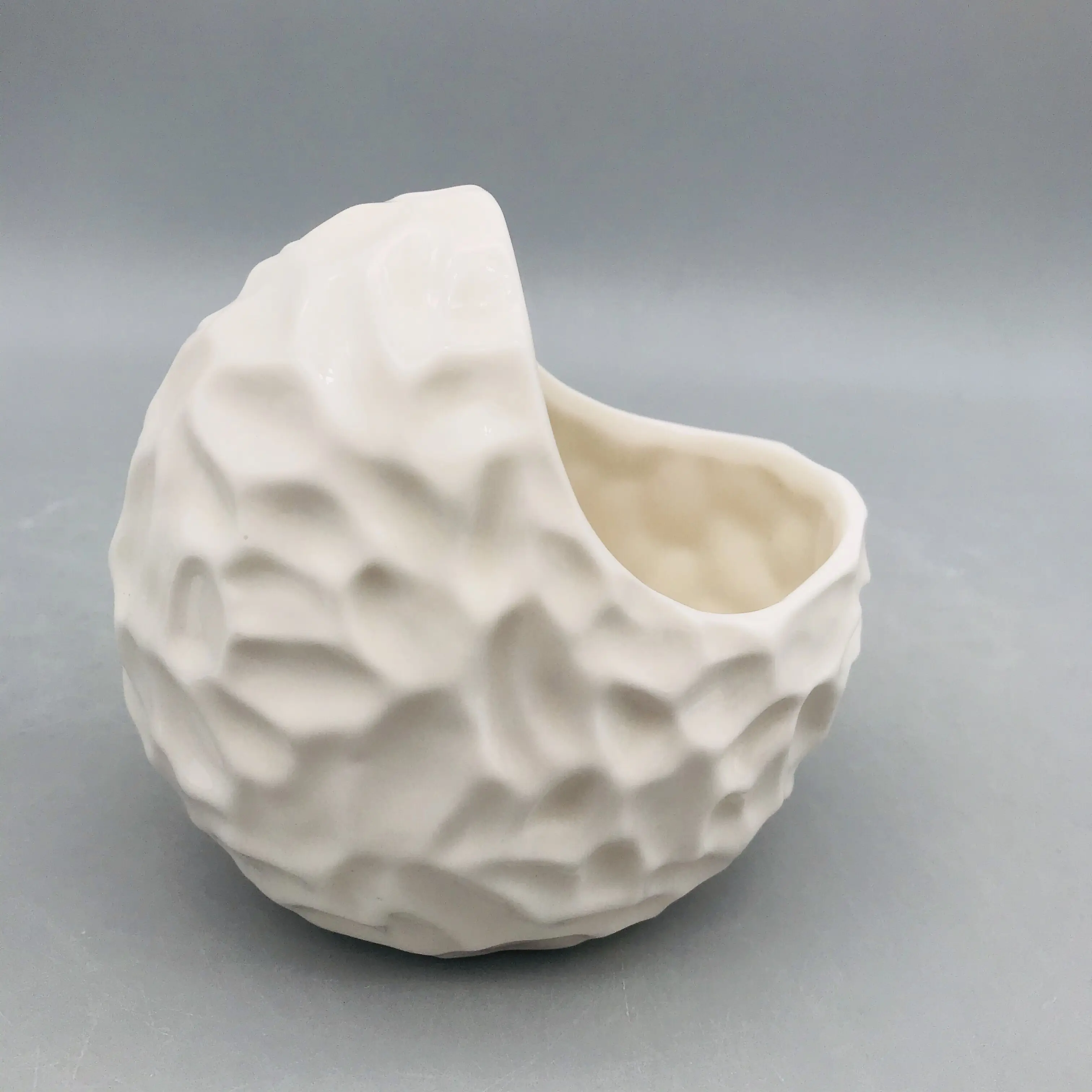 Original design irregular shape white porcelain pot for kitchen