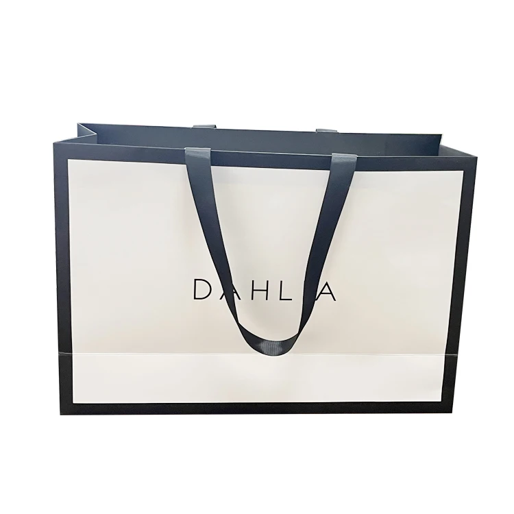 Wholesale custom low price eco friendly recycles gift shopping paper bag with your own logo