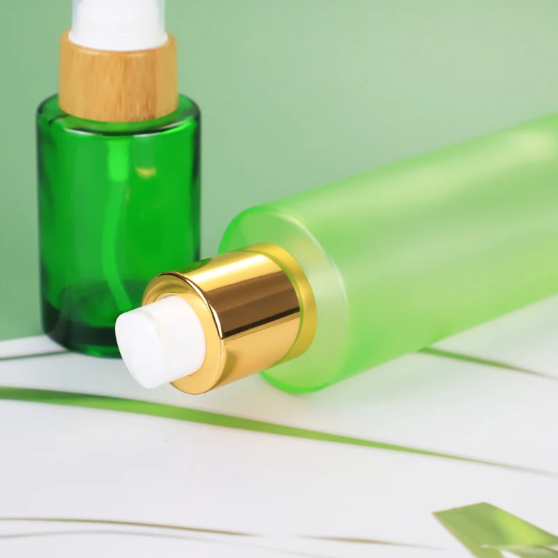 
Factory Custom Gold Cap Green Clear 100ml Glass Dropper Bottle Glass Lotion Pump Bottle 