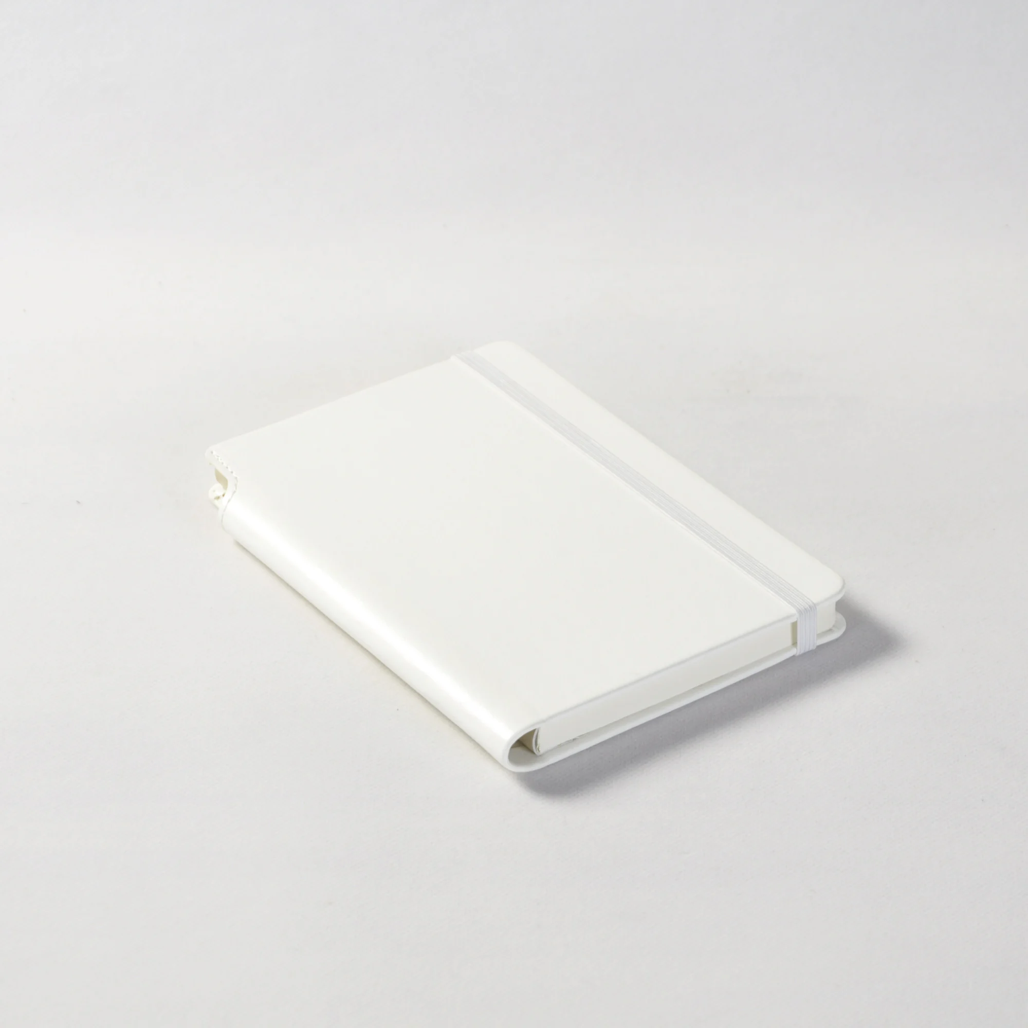 custom sketchbook printing, pink pu leather emboss logo recycled paper notebook b5 a5 with pen loop on cover spine